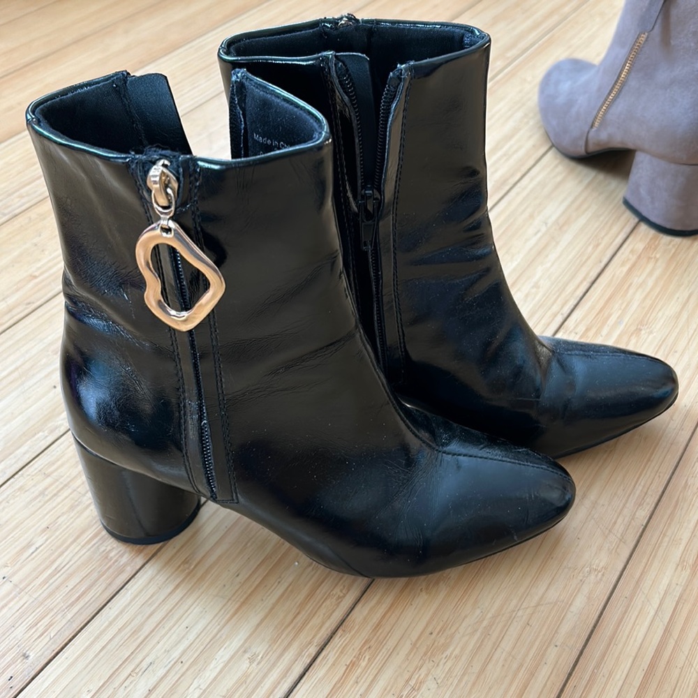 Black patent ankle boots.  Not real leather worn once